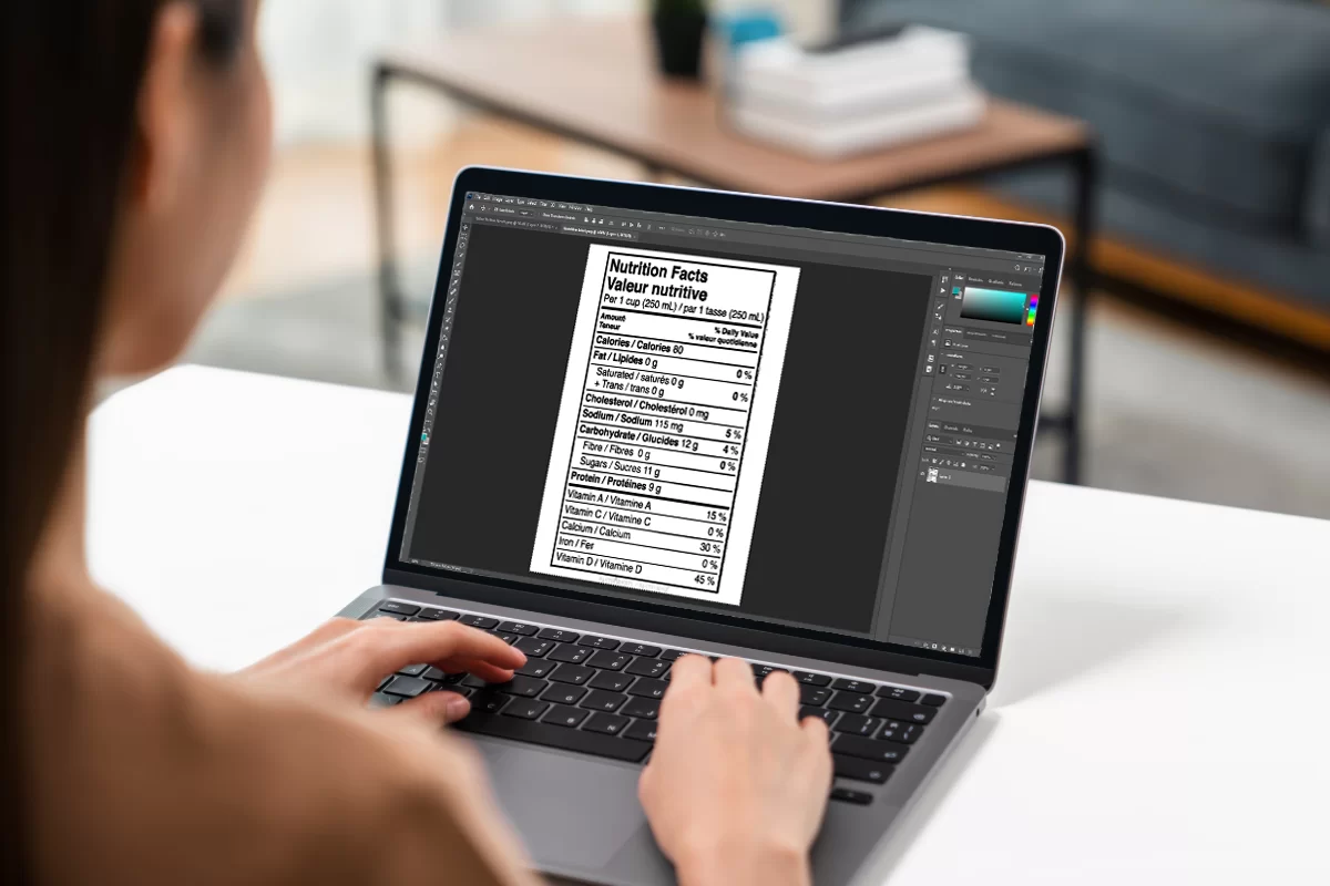 A woman editing a nutrition facts maker template